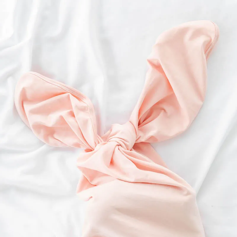 Nodo Gowns